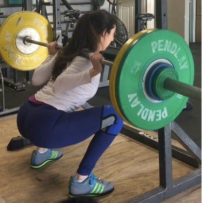 brittany-squatting with a barbell on her back