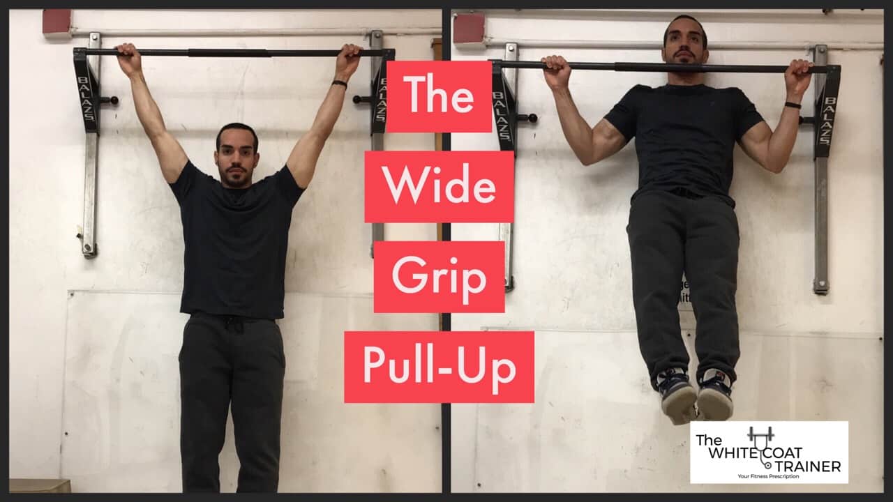 wide-grip-pull-up-exercise: alex doing a pullup with a wider than shoulder width grip