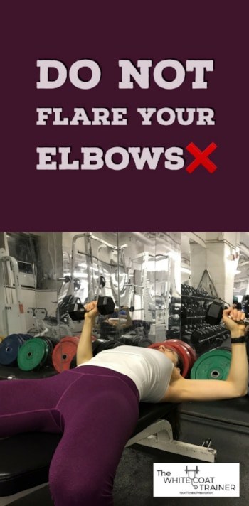 dumbbell bench press wrong technique showing elbows flaring out to 90 degrees from the body