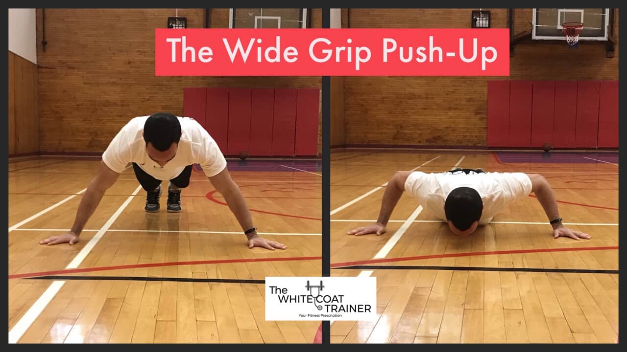 wide grip pushup: Alex doing a pushup with his hands wider than shoulder width