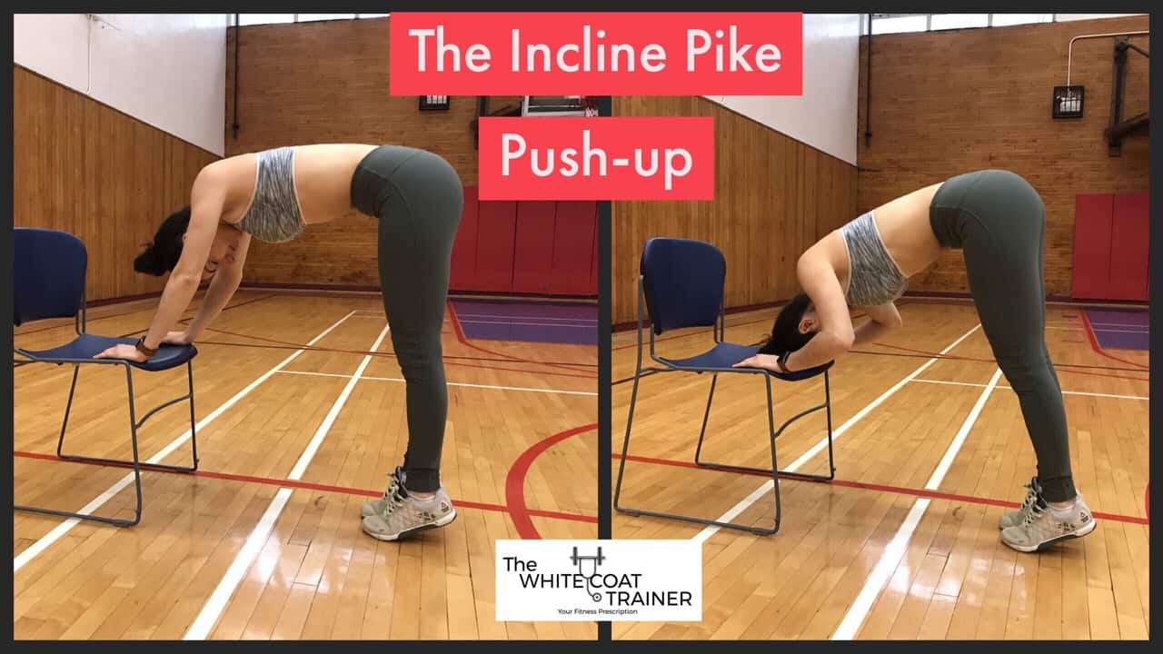 incline-pike-pushup-exercise: Brittany with her hands on a chair and bringing the crown of her head toward the chair by bending at the elbows