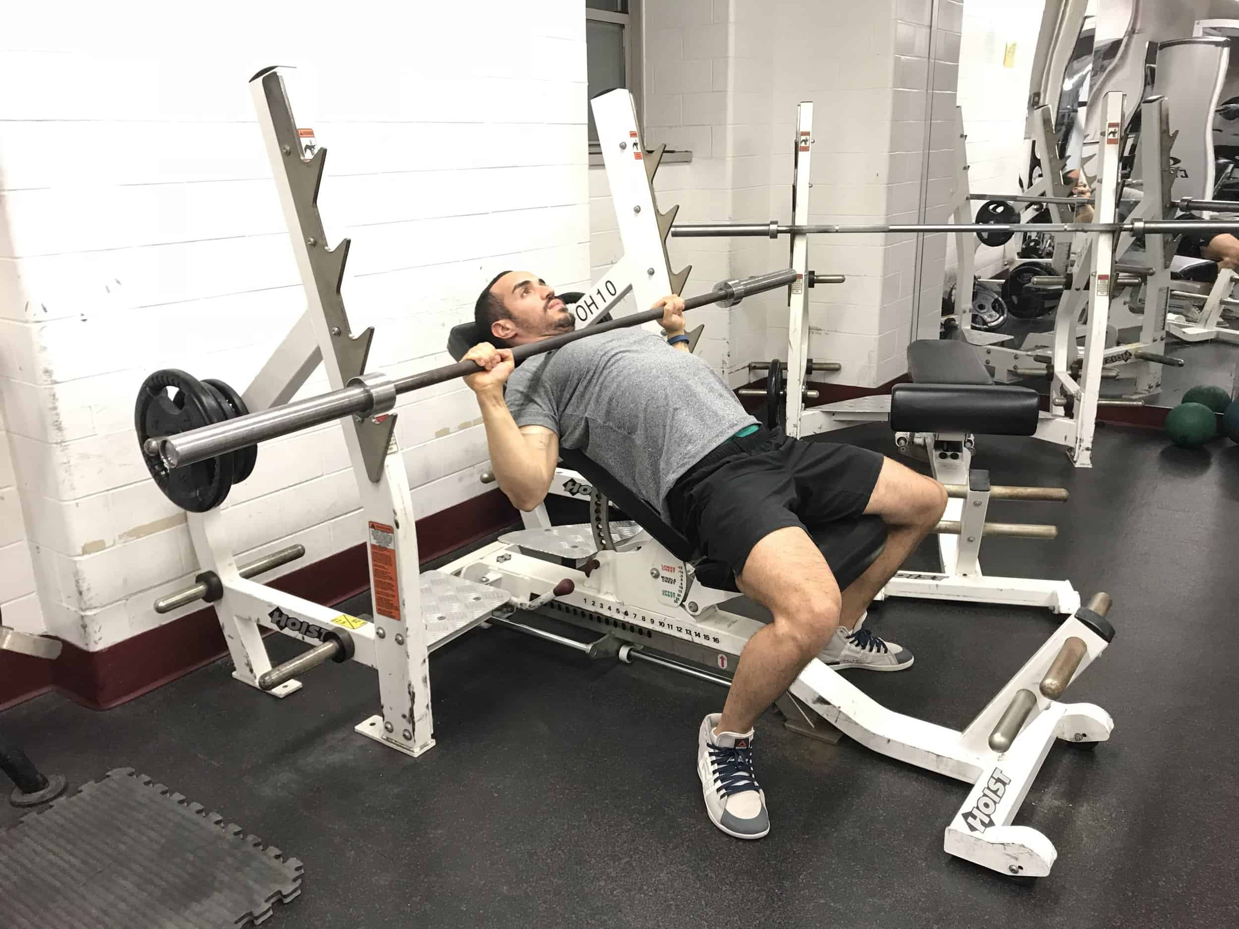 incline-bench-press-bottom-position with barbell lowered to upper chest