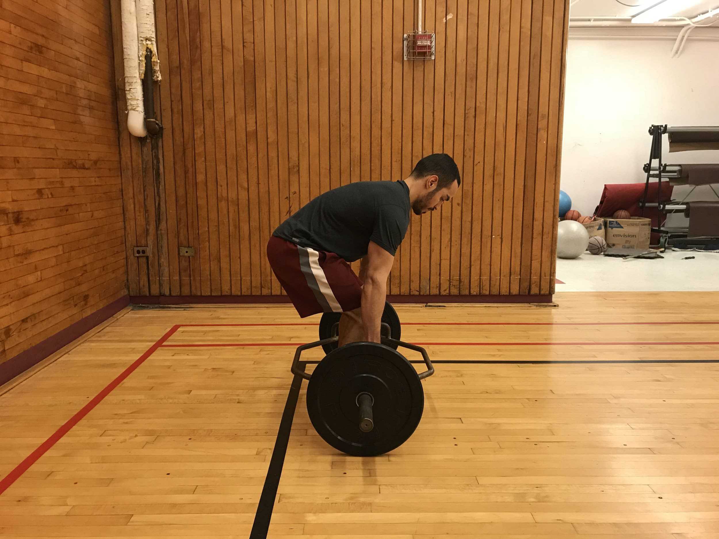 trap bar deadlift bad form with rounded spine