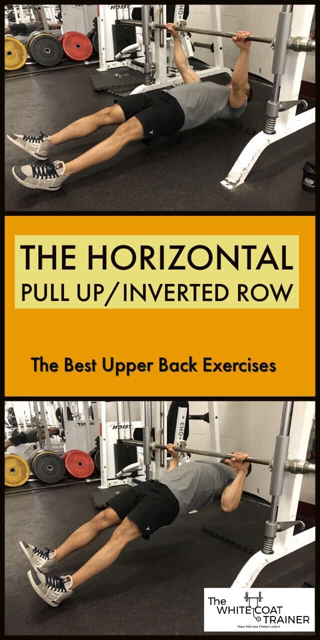 Fit woman preparing for the pull-ups on the horizontal bar Stock