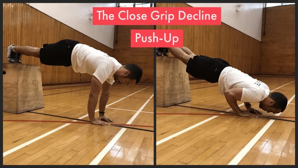 decline close grip pushup: Alex doing a pushup with his feet elevated on a box and with his hands close together