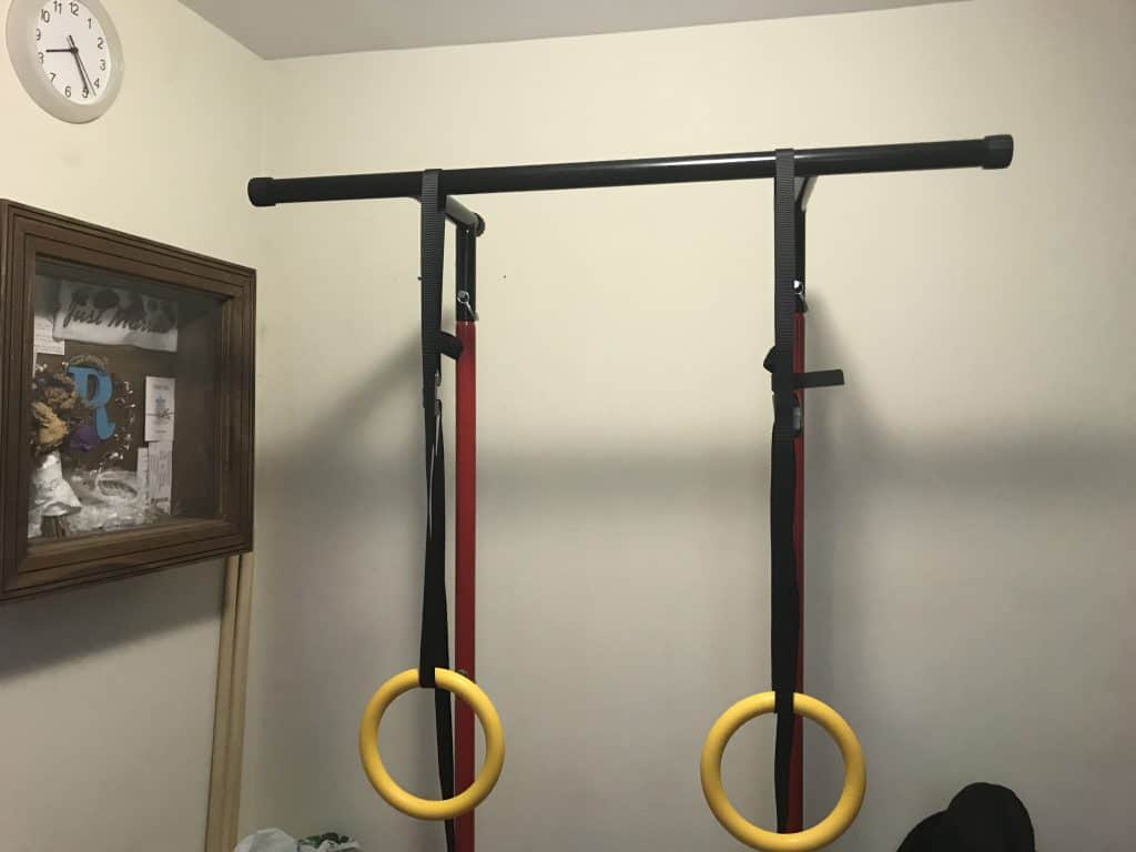 a pull up bar with gymnastic rings