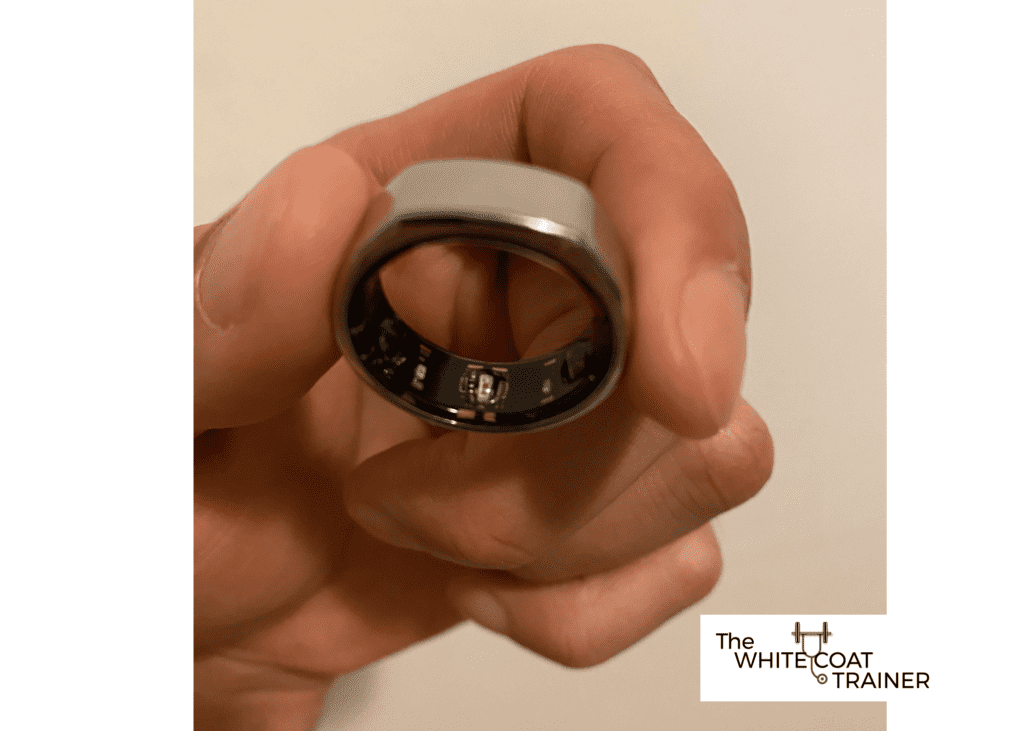 holding the oura ring in my fingers